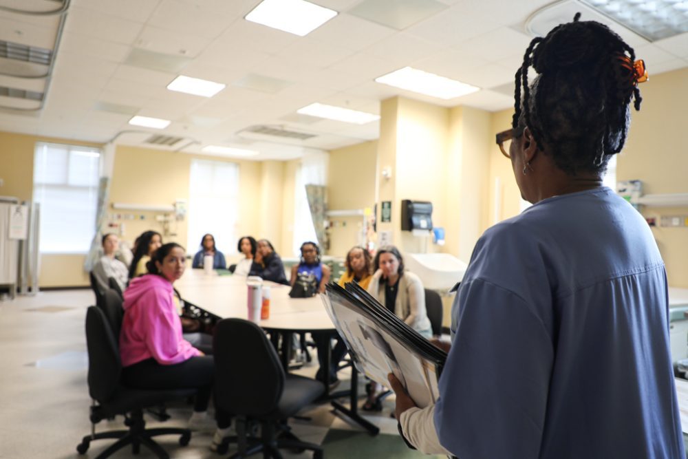 Facilitator engaging the audience at the Respectful Maternity Care Simulator Event